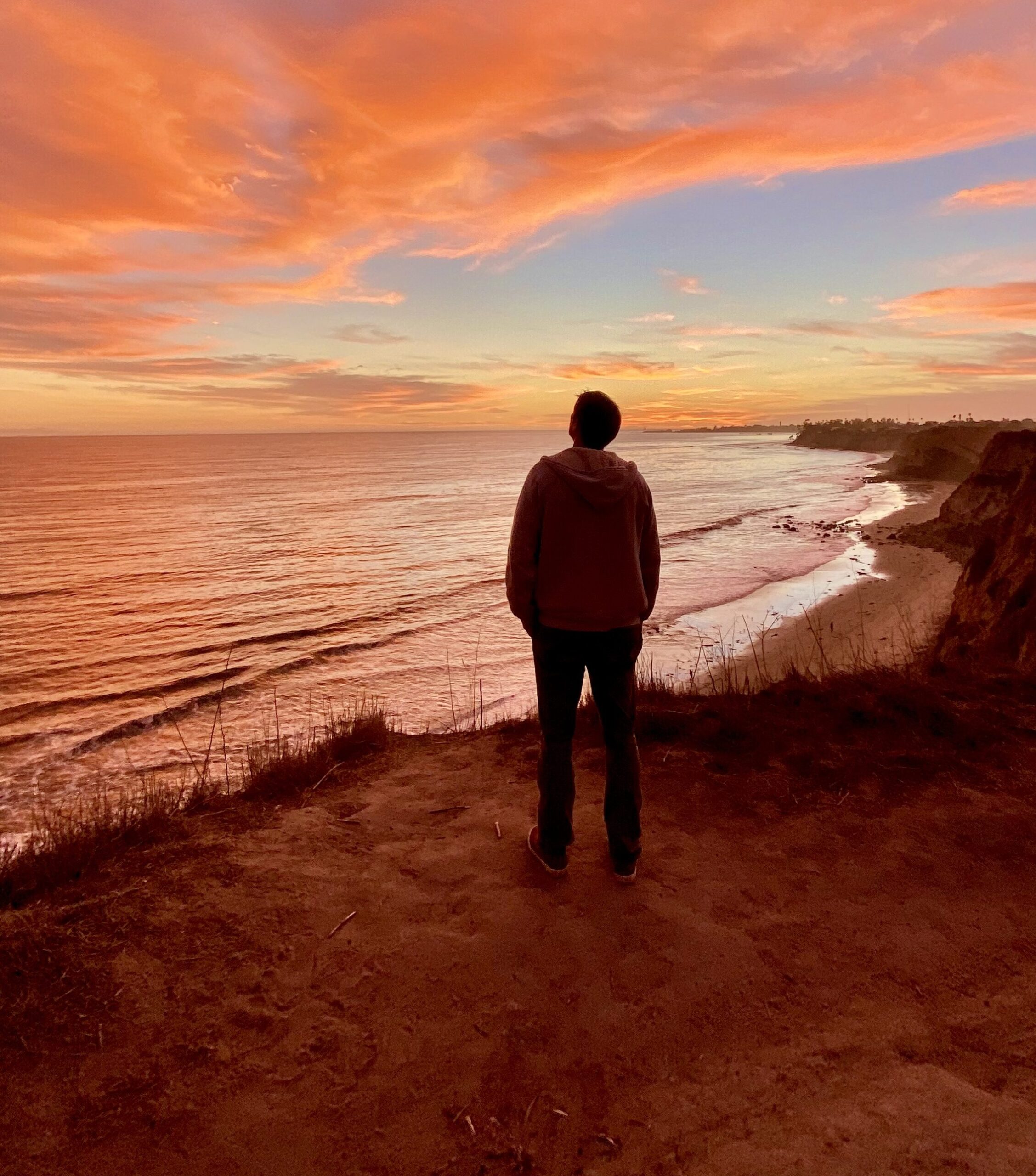 image of guy looking at ocean